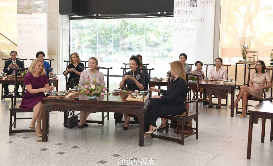 Peng Liyuan and wives of G20 summit leaders visit China Academy of Art