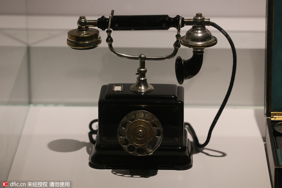 Antique cars, typewriter and telephone on display in Shanghai