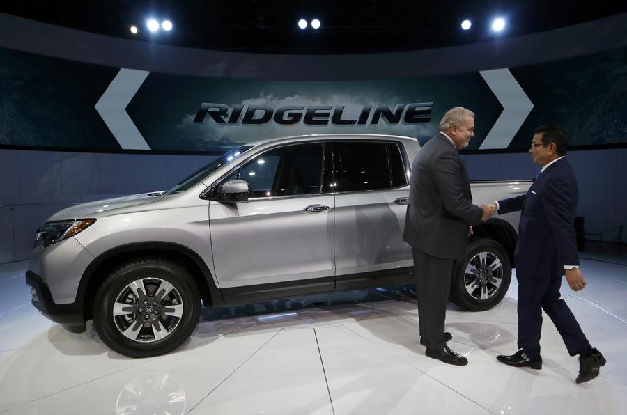 Execs introduce new models at Detroit Auto Show