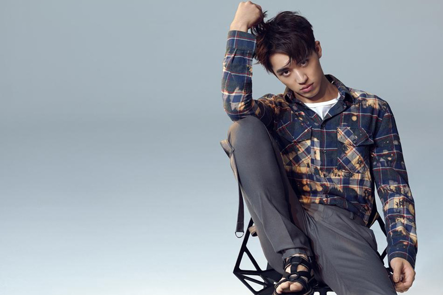 Actor Xu Weizhou poses for fashion magazine