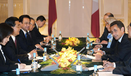 Chinese, French presidents meet in London