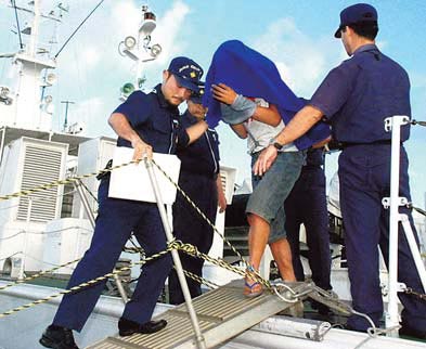 Chinese boat crew flying home