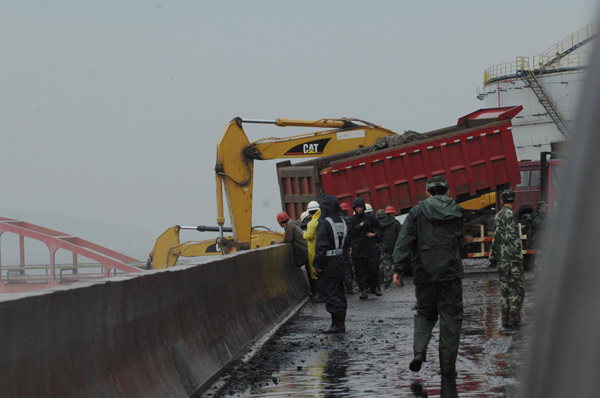 Chemical spill feared as dike breaches amid storm