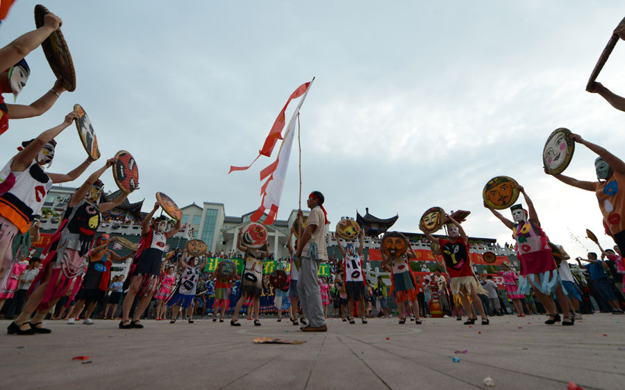 Nuo Dance performed in Fenlong Festival in Hechi, S China