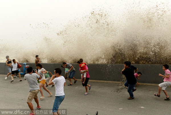 Qiantang river tide drenches spectators