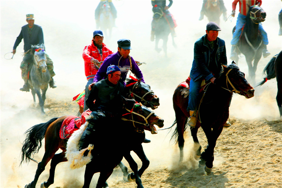 Herdsmen of Tajik ethnic group play traditional game