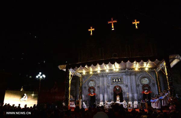 Catholics in Xi'an celebrate Christmas Eve in church