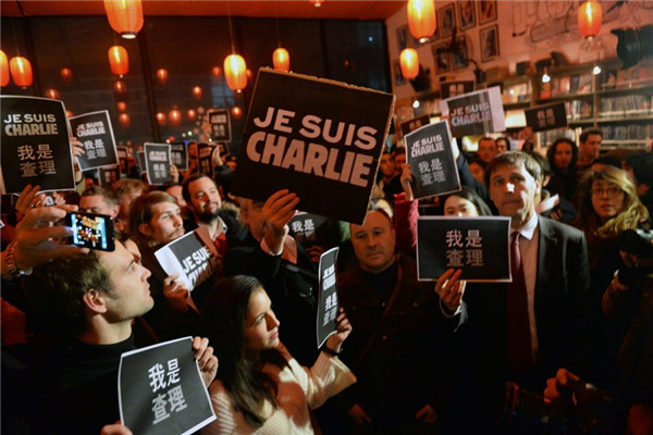 Foreign press mourns Paris victims in Beijing