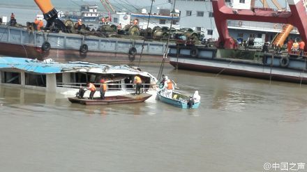 Capsized ship righted, recovery teams set to enter the vessel