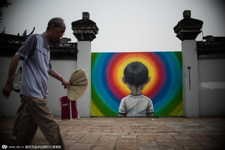 French street artist finds inspiration in Shanghai village