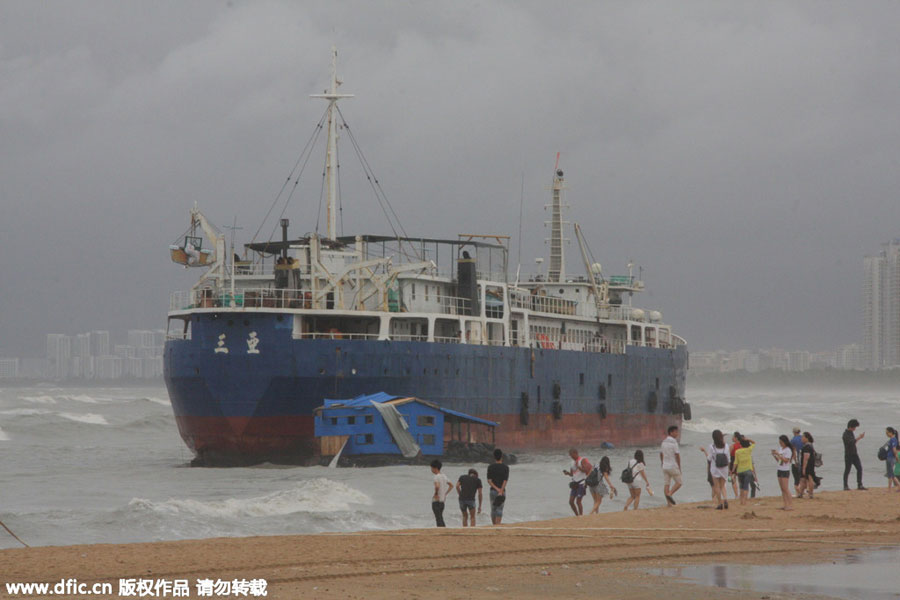 Three ships stranded as tropical storm Kujira hits S China