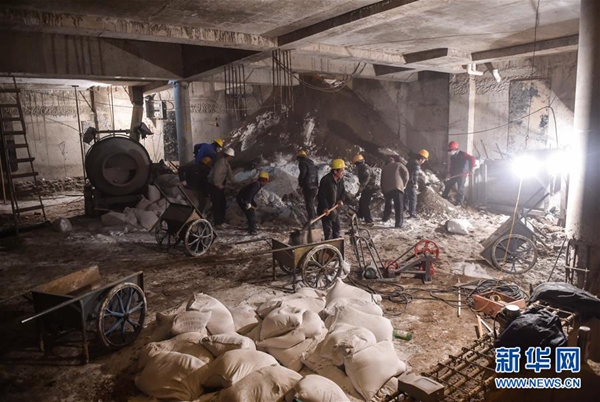 Huge illegal basement being backfilled in downtown Beijing