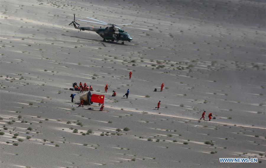 Reentry module aboard Long March-7 lands successfully