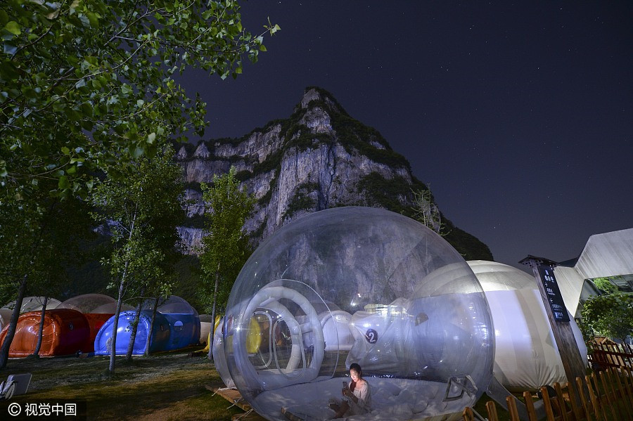 Transparent domes offer spectacular view of night sky in Hunan