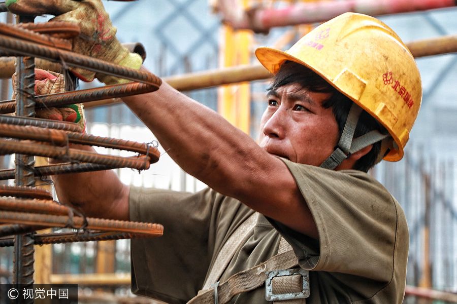 Workers stick to their job in baking sun