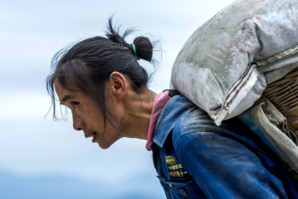 Laborer lifts heavy loads to build better life