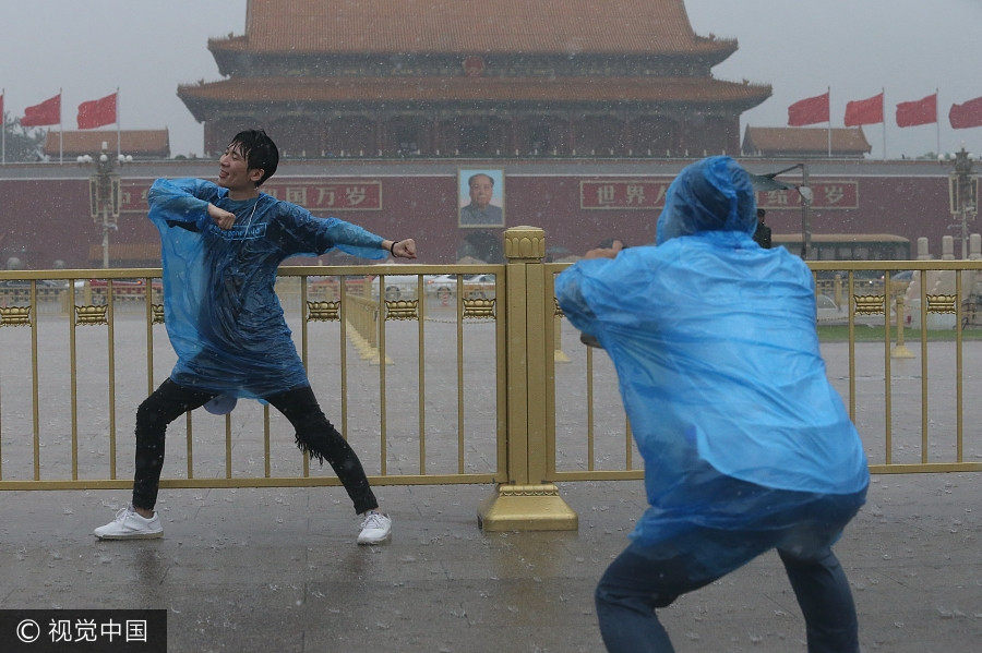 Love for Beijing despite rainstorm