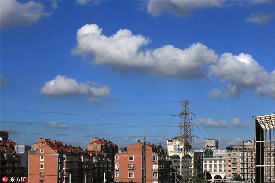 After scorching heat, autumn's blue skies a pleasant sight