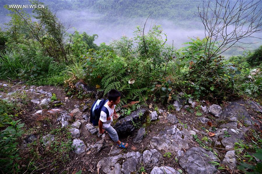 Mountains can't stop boy's dream of going to school