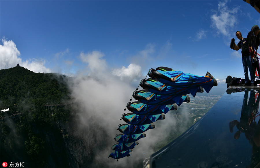 Wingsuit flying championship kicks off in Hunan