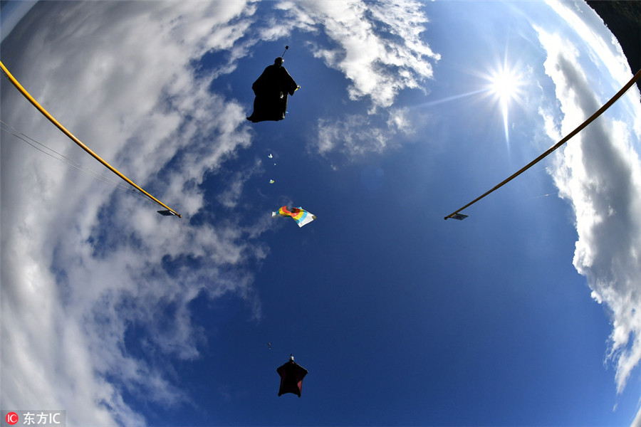 Wingsuit flying championship kicks off in Hunan