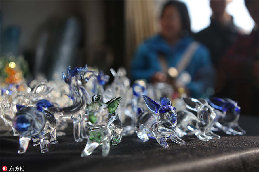 Glass artwork shines in winter