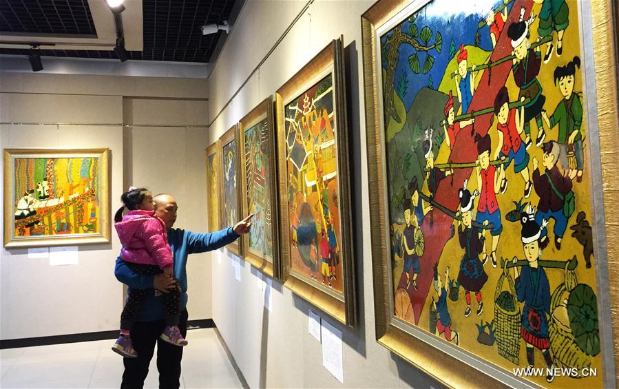 Exhibition on farmer paintings of Dong ethnic group held in S China