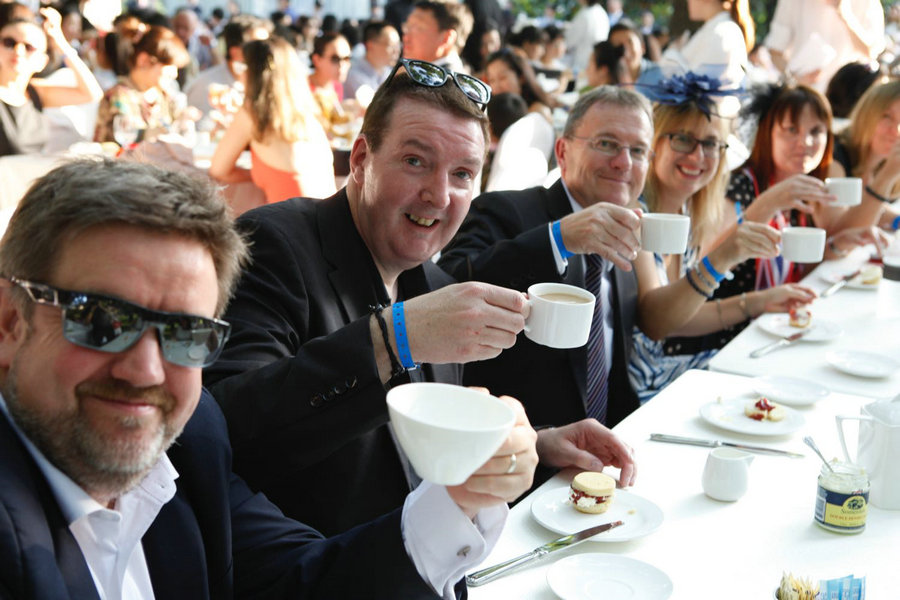 World's largest cream tea party marks Queen's 90th in China