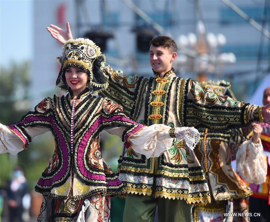 Models present costumes in China's Inner Mongolia