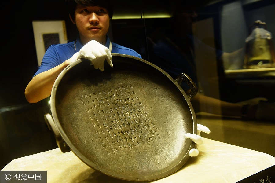 Ancient bronze plate breaks auction record