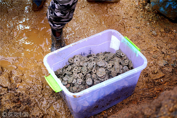 5.6 tons of ancient coins unearthed under house in Jiangxi