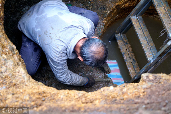 5.6 tons of ancient coins unearthed under house in Jiangxi