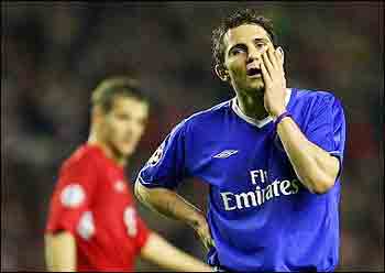 Lampard reacts : Chelsea's Frank Lampard wipes his face at the end of his match against Liverpool during their second leg semi-final football match at Anfield in Liverpool, England. Liverpool won 1-0 and advance to the Champion's League final. (AFP