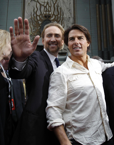 Actors Nicolas Cage and Tom Cruise attend hand and footprints ceremony for producer Jerry Bruckheimer