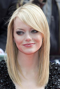 Emma Stone laughs at style icon tag