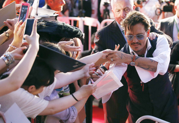 Depp promotes 'The Lone Rangers' in Tokyo