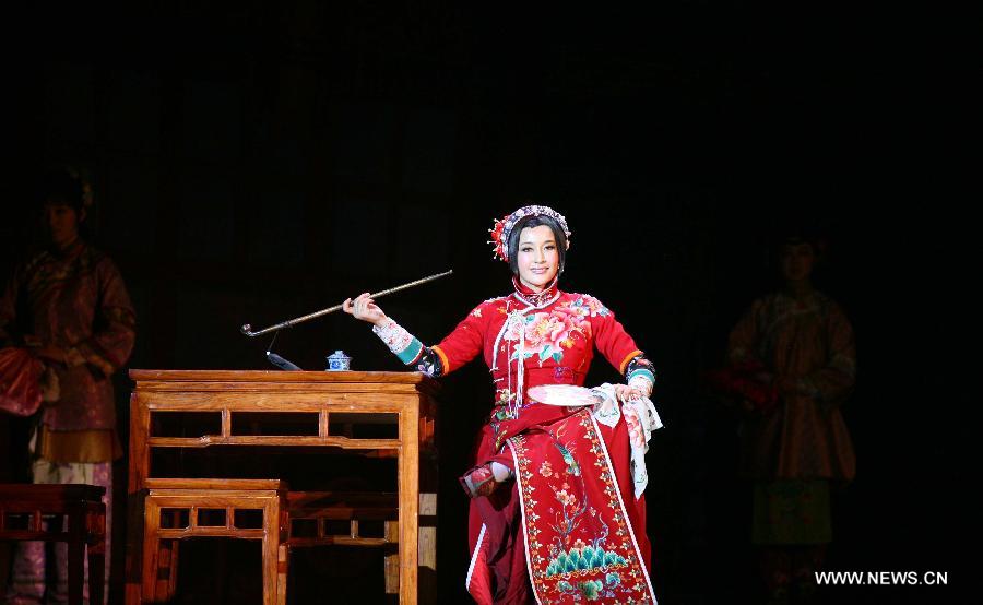 Actress Liu Xiaoqing performs stage drama