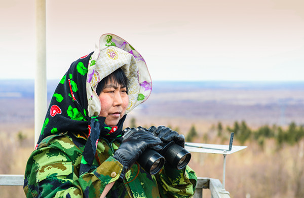 Forest ranger guards her woodland home against fire