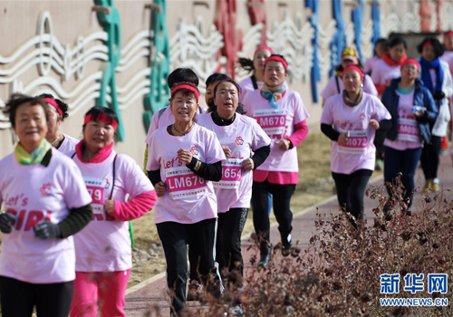 Women enter a walking race on their day