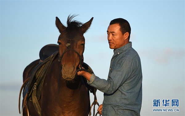 Farmer escapes poverty by raising camels