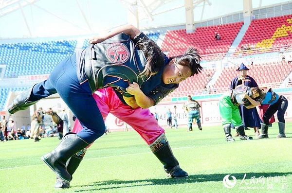 Female wrestlers compete at ethnic games