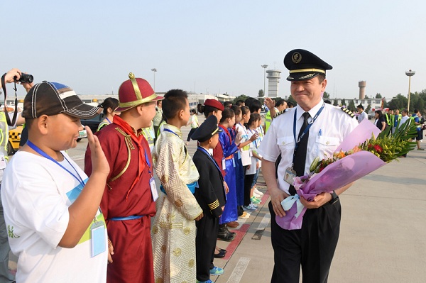 Mongolian teenagers visit Boeing airplane