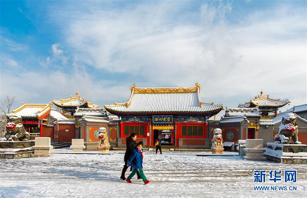 Spring snow blankets Hohhot