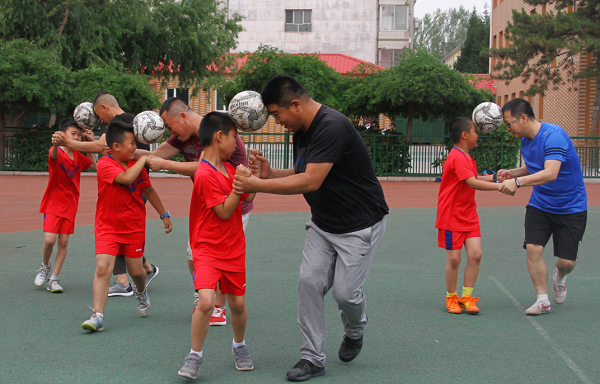 Fathers and sons have soccer fun