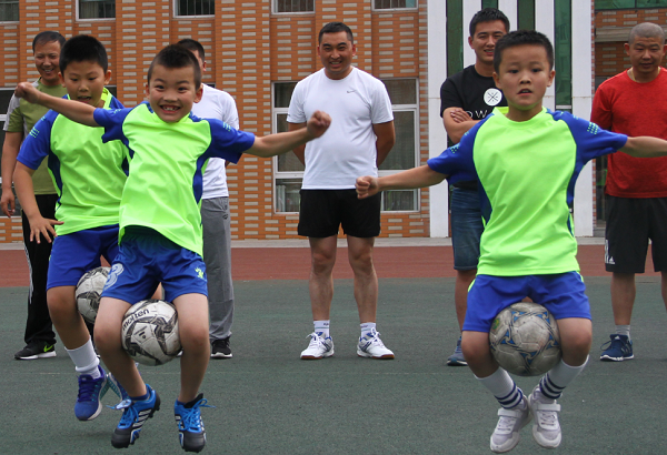 Fathers and sons have soccer fun