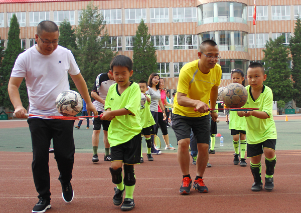 Fathers and sons have soccer fun