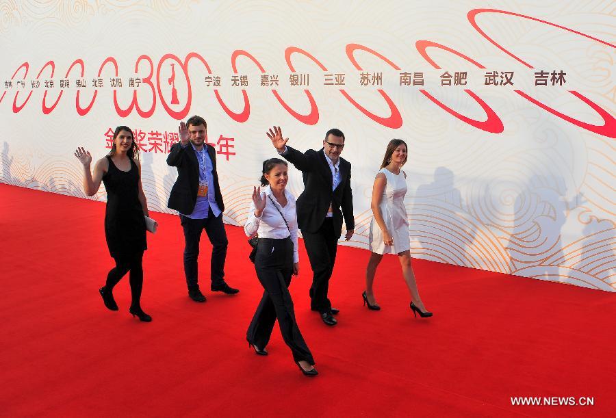 Stars shine at red carpet of 24th China Golden Rooster and Hundred Flowers Film Festival