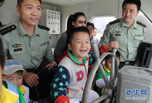 Children show their patriotism at sea