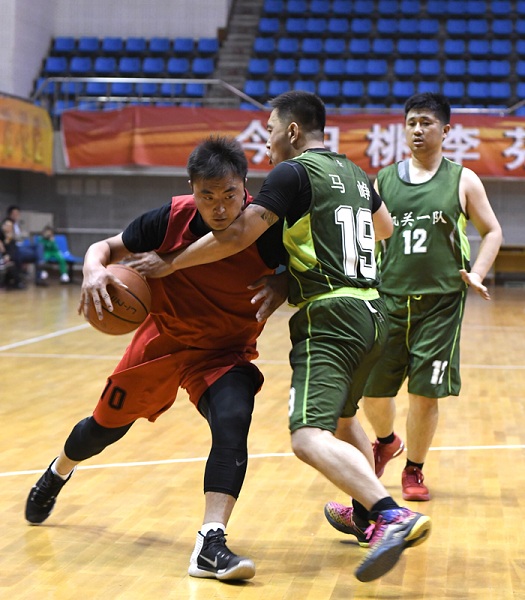 Shanxi University holds faculty basketball competition