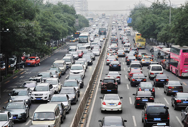 Tougher penalties and lower toll fees can curb truck overloading